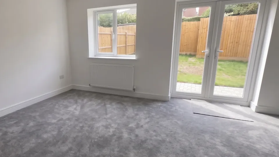 Living room with French doors to the garden