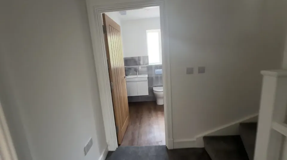 Landing with the family bathroom beyond